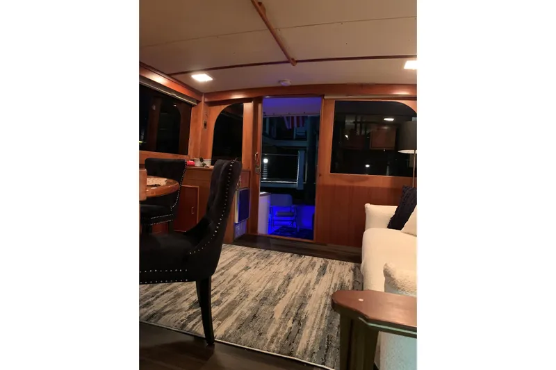  Yacht Photos Pics Interior of 1985 Post 43 Convertible yacht with elegant seating and ambient lighting.