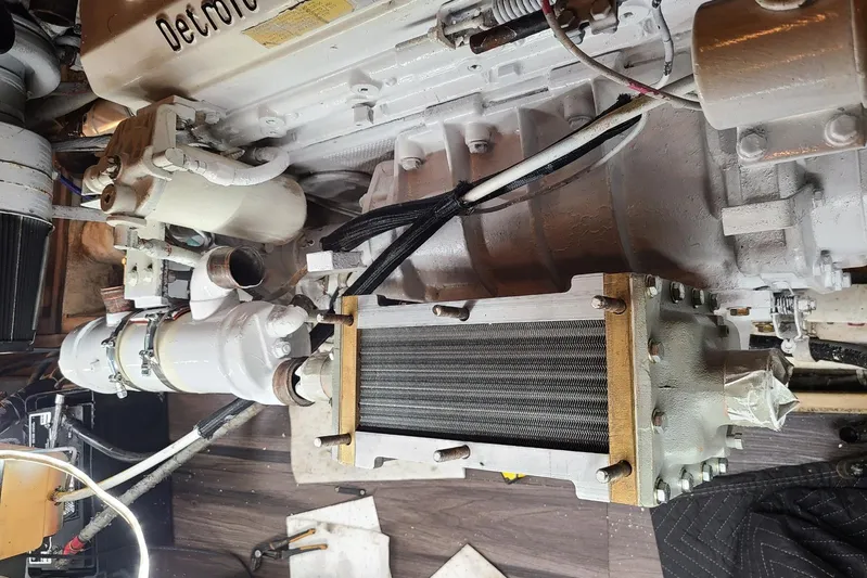  Yacht Photos Pics Engine compartment of a 1985 Post 43 Convertible boat, featuring Detroit Diesel components.