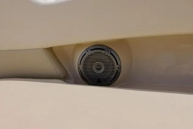  Yacht Photos Pics Speaker on 2021 Boston Whaler 320 Vantage boat, integrated into beige interior panel.