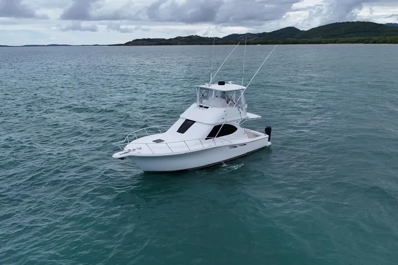  Yacht Photos Pics 2007 Tiara Yachts 3900 Convertible on open water with scenic background.