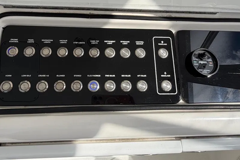  Yacht Photos Pics Control panel of a 2007 Tiara Yachts 3900 Convertible with various switches and dials.