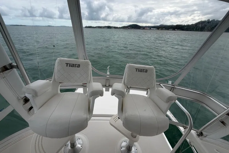  Yacht Photos Pics 2007 Tiara Yachts 3900 Convertible helm chairs overlooking serene ocean view.