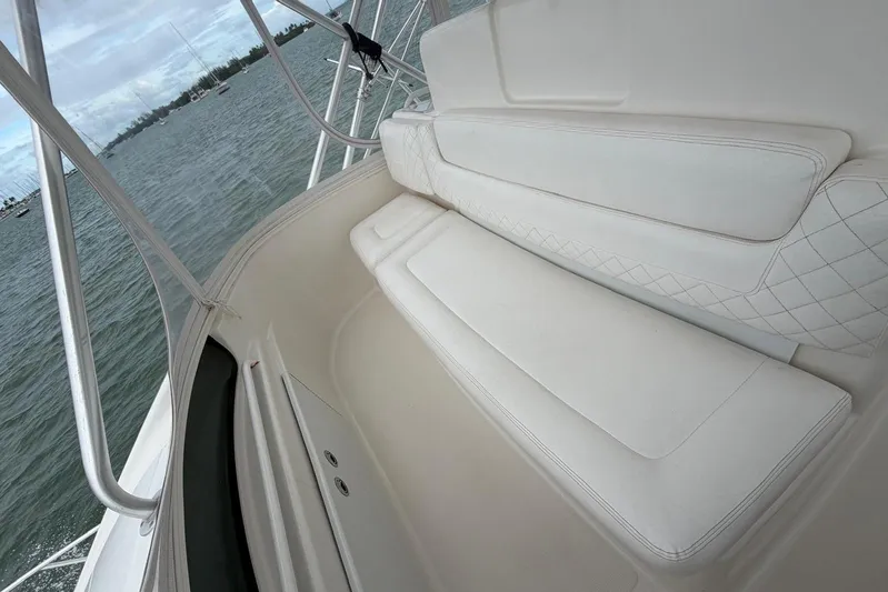  Yacht Photos Pics 2007 Tiara Yachts 3900 Convertible boat with white cushioned seating on deck.