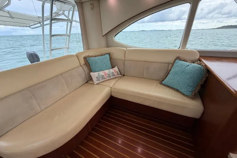  Yacht Photos Pics Luxurious interior of 2007 Tiara Yachts 3900 Convertible with ocean view and plush seating.