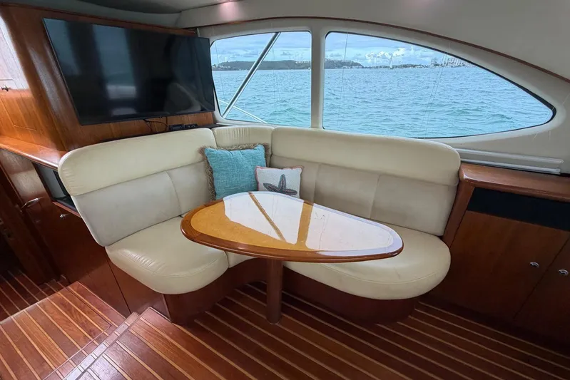  Yacht Photos Pics Luxurious interior of 2007 Tiara Yachts 3900 Convertible with elegant seating and ocean view.