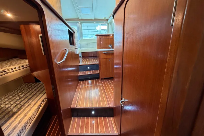  Yacht Photos Pics 2007 Tiara Yachts 3900 Convertible interior with wood finish and cozy cabin.