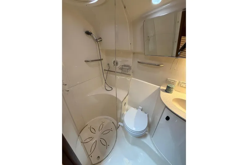  Yacht Photos Pics Luxurious bathroom in 2007 Tiara Yachts 3900 Convertible, featuring shower and modern amenities.