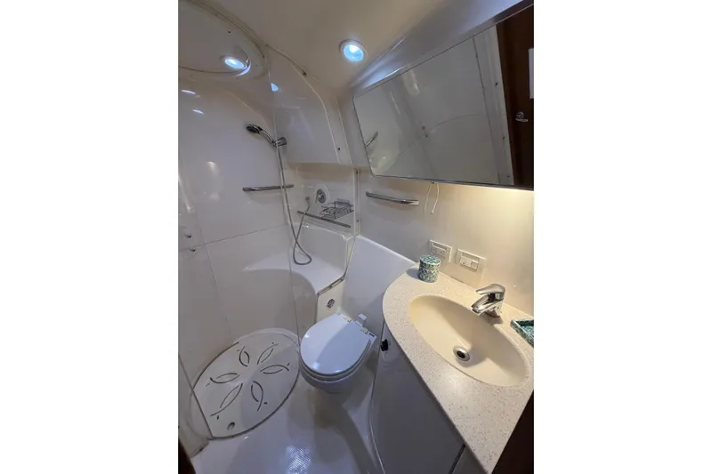  Yacht Photos Pics Luxurious bathroom in 2007 Tiara Yachts 3900 Convertible, featuring modern fixtures and elegant design.