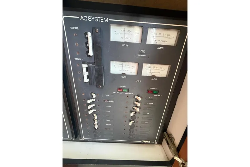  Yacht Photos Pics Electrical panel of 2007 Tiara Yachts 3900 Convertible, showing AC system controls.