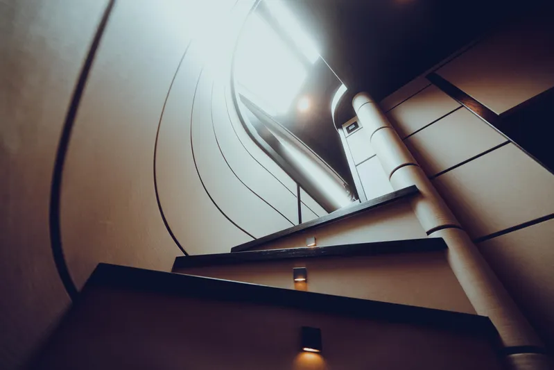 Black Rock Yacht Photos Pics Spiral staircase with modern design, Custom 77 model, 2008.