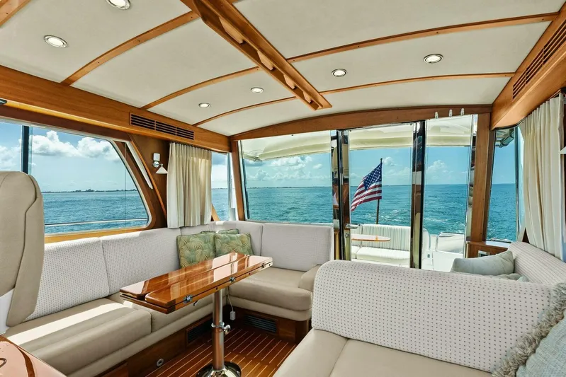 Rowe Boat Yacht Photos Pics Luxurious interior of 2018 Sabre 48 Salon Express yacht with ocean view.