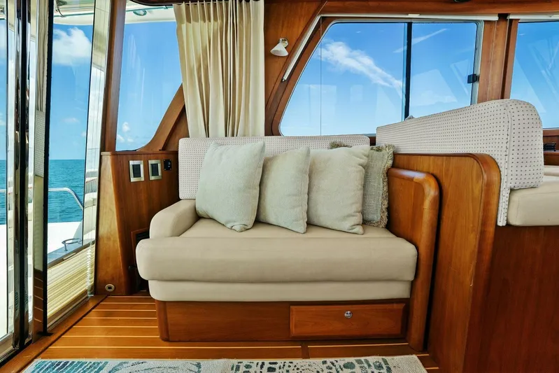 Rowe Boat Yacht Photos Pics Interior of 2018 Sabre 48 Salon Express yacht with cozy seating and ocean view.