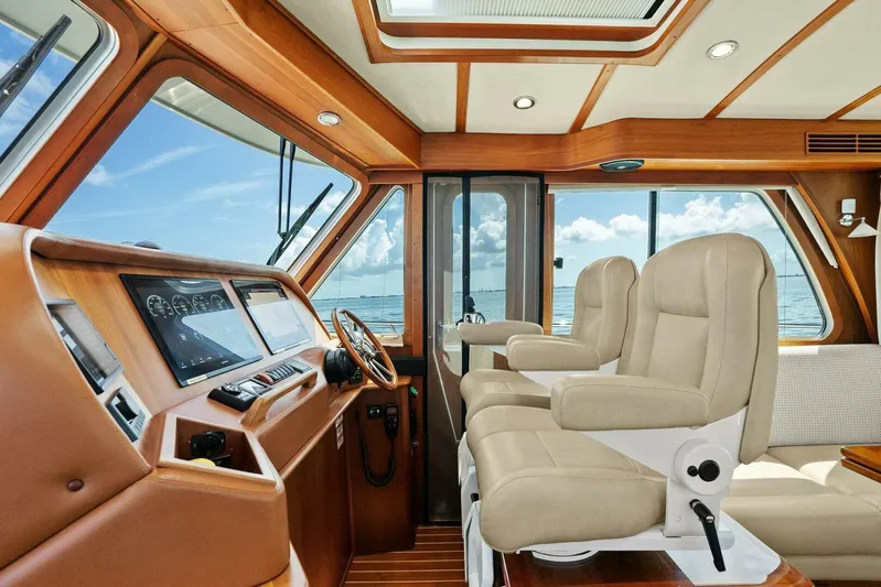 Rowe Boat Yacht Photos Pics Interior of 2018 Sabre 48 Salon Express yacht with luxurious seating and navigation controls.