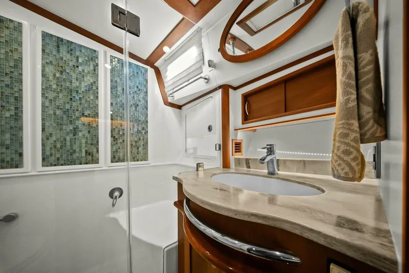 Rowe Boat Yacht Photos Pics Luxurious bathroom in 2018 Sabre 48 Salon Express yacht with elegant fixtures and mosaic tiles.