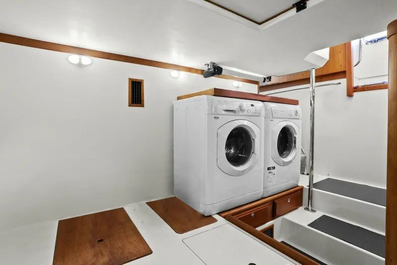 Rowe Boat Yacht Photos Pics Laundry area in 2018 Sabre 48 Salon Express yacht with washer and dryer.