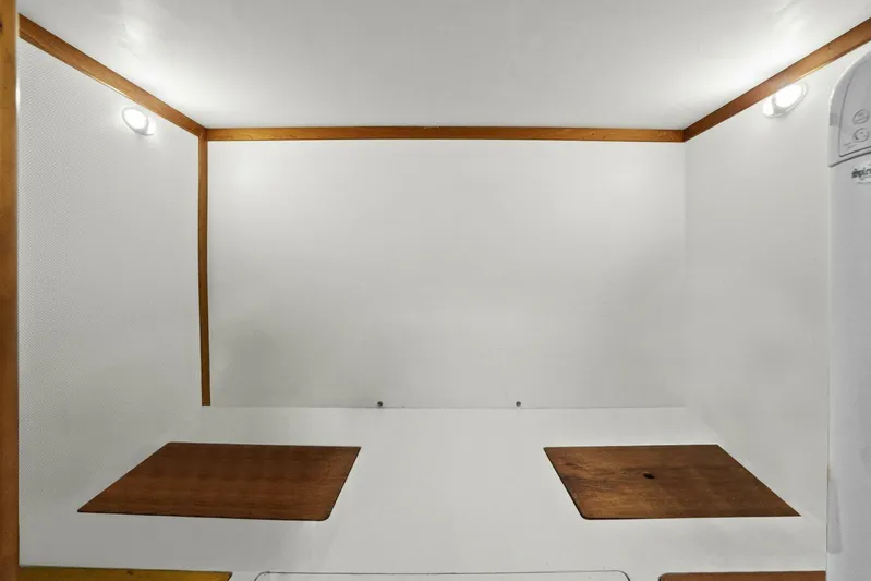 Rowe Boat Yacht Photos Pics Interior of 2018 Sabre 48 Salon Express, featuring minimalist white and wood design.