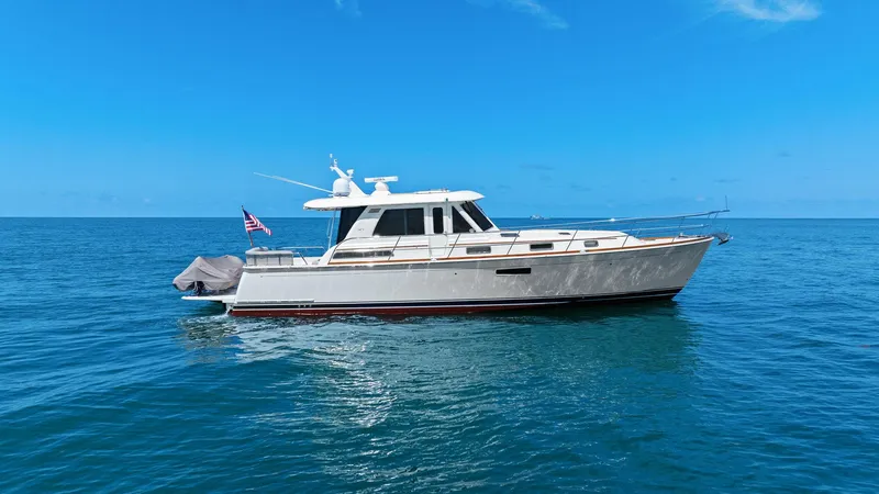 Rowe Boat Yacht Photos Pics 2018 Sabre 48 Salon Express yacht cruising on open blue sea.