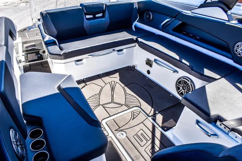  Yacht Photos Pics 2024 Scarab 285 ID boat interior with sleek seating and modern design.