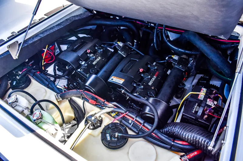  Yacht Photos Pics Engine compartment of 2024 Scarab 285 ID boat, featuring Rotax engines and wiring.