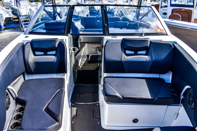  Yacht Photos Pics 2024 Scarab 285 ID boat interior with sleek seating and modern design.