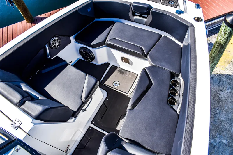  Yacht Photos Pics 2024 Scarab 285 ID boat interior with sleek seating and modern design.