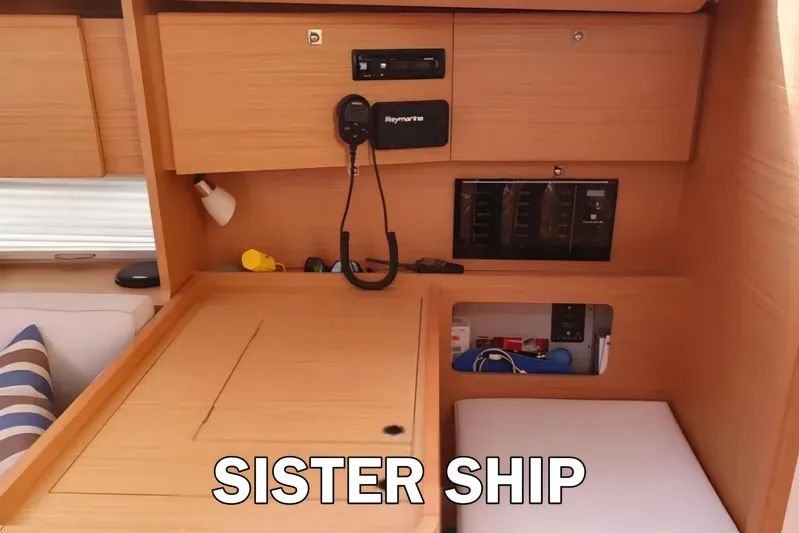  Yacht Photos Pics Interior of 2020 Dufour 360 Grand Large yacht with navigation equipment and storage.