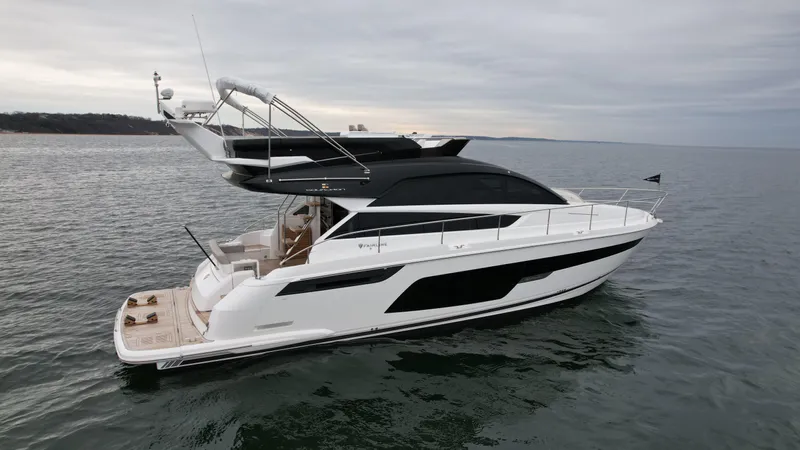  Yacht Photos Pics 2024 Fairline Squadron 50 luxury yacht cruising on open water.
