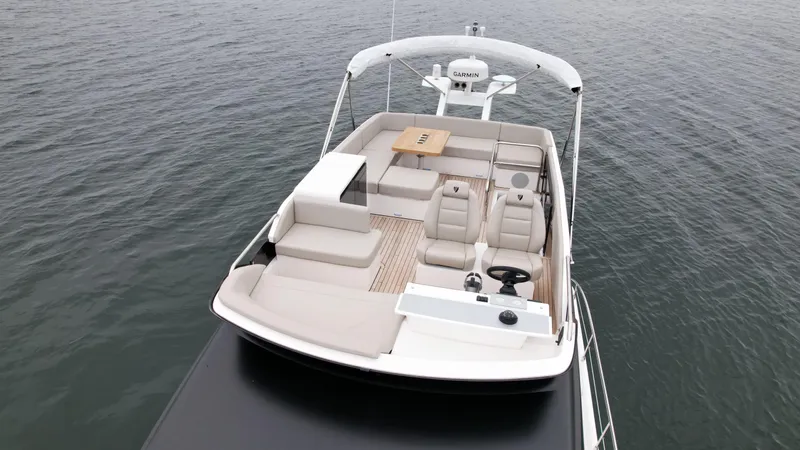  Yacht Photos Pics Fairline Squadron 50 2024 yacht flybridge with seating and helm station.