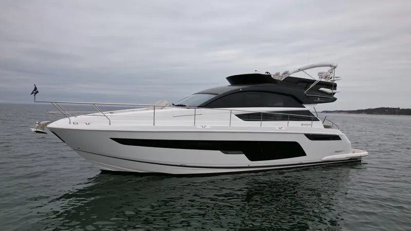  Yacht Photos Pics 2024 Fairline Squadron 50 luxury yacht on calm waters.