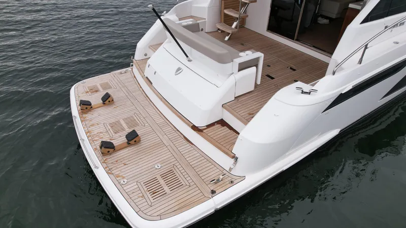  Yacht Photos Pics 2024 Fairline Squadron 50 yacht with spacious teak deck and swim platform.
