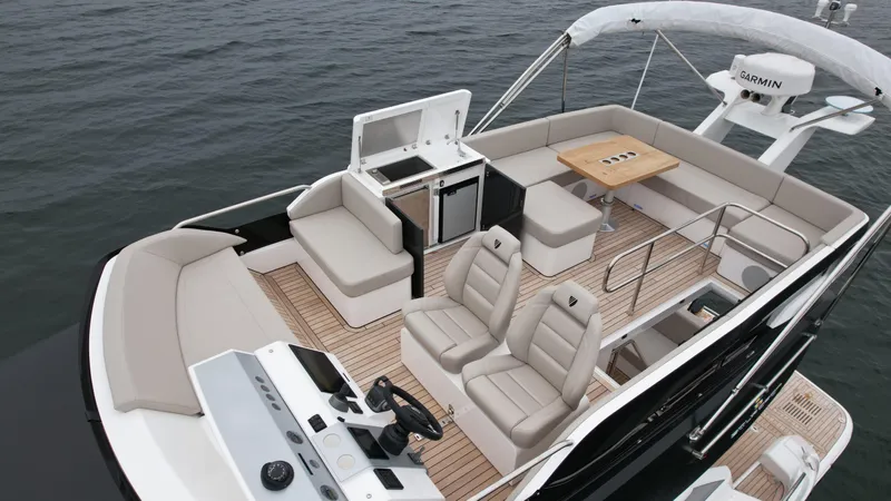  Yacht Photos Pics 2024 Fairline Squadron 50 luxury yacht with spacious deck and modern seating.