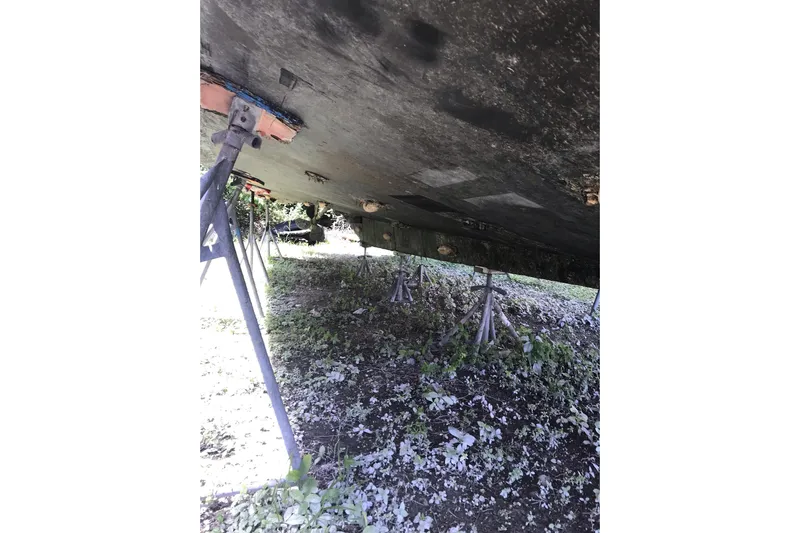 Tuff Baby Yacht Photos Pics Underneath view of a 1999 Custom Sport Fishing boat on stands.