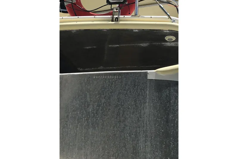 Tuff Baby Yacht Photos Pics 1999 Custom Sport Fishing boat hull with visible identification number.