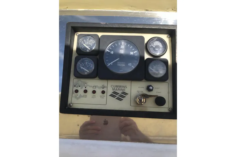 Tuff Baby Yacht Photos Pics Instrument panel of a 1999 Custom Sport Fishing boat with Cummins Marine gauges.