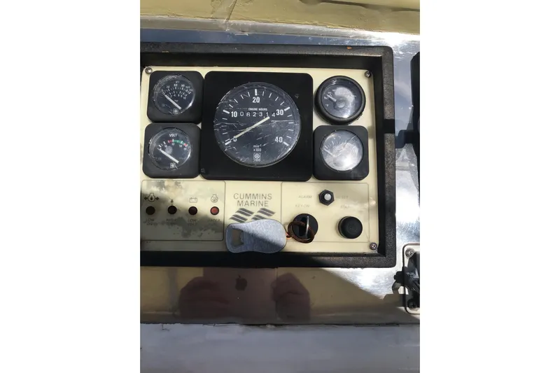 Tuff Baby Yacht Photos Pics Instrument panel of a 1999 Custom Sport Fishing boat with Cummins Marine gauges.