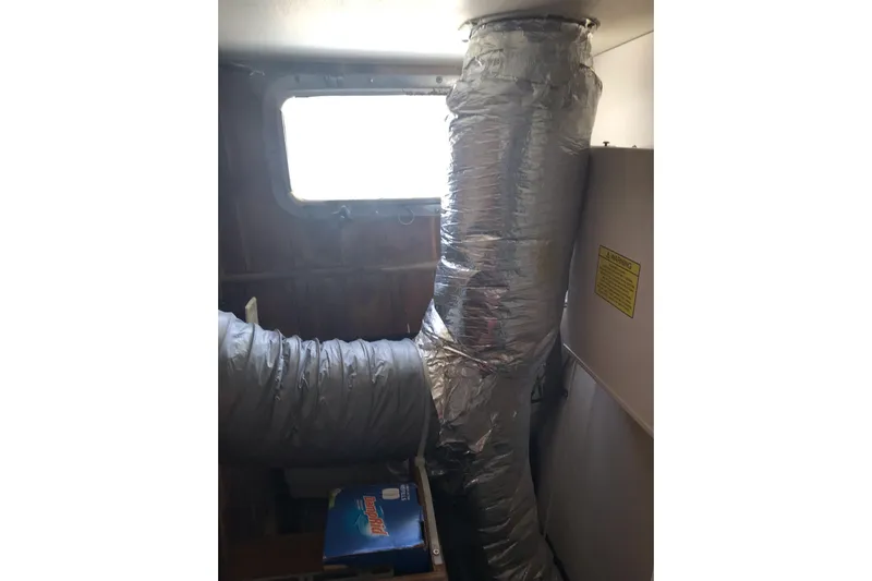 Tuff Baby Yacht Photos Pics Interior of a 1999 Custom Sport Fishing boat with insulated ductwork and window.