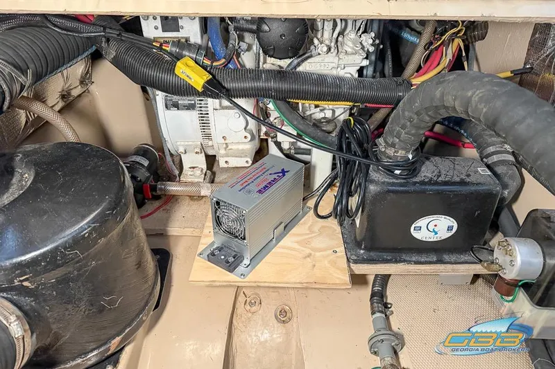  Yacht Photos Pics Engine compartment of a 2013 Cutwater C-28 boat, featuring various mechanical components.