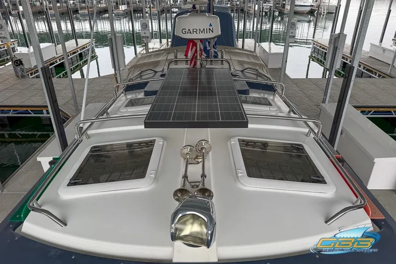  Yacht Photos Pics 2013 Cutwater C-28 boat with solar panel and Garmin equipment at marina dock.