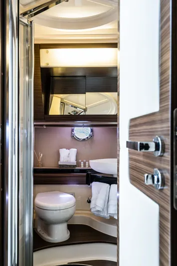 Kenostar Yacht Photos Pics Luxurious bathroom interior of 2015 Azimut 55S yacht, featuring modern fixtures and elegant design.