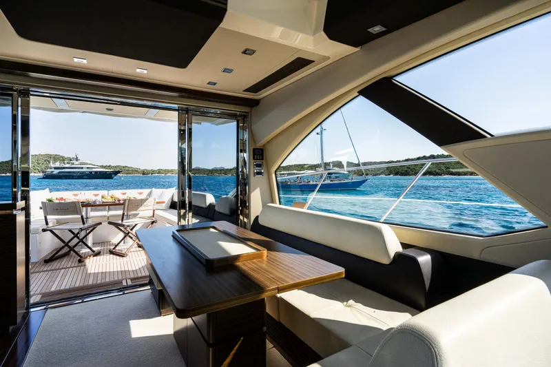 Kenostar Yacht Photos Pics Luxurious interior of 2015 Azimut 55S yacht with scenic ocean view.