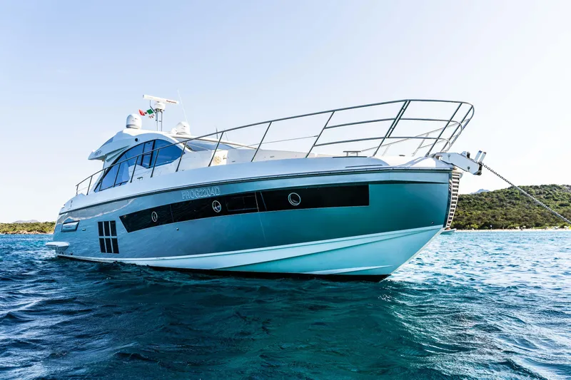 Kenostar Yacht Photos Pics 2015 Azimut 55S yacht on clear blue water, showcasing sleek design and luxury features.