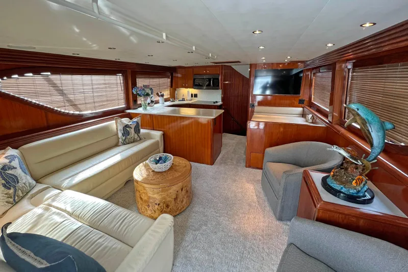 Empress Yacht Photos Pics Luxurious interior of 2000 Hatteras 60 Convertible yacht with elegant furnishings and decor.
