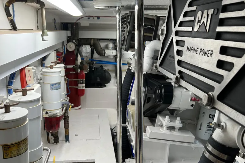 Empress Yacht Photos Pics Engine room of 2000 Hatteras 60 Convertible with CAT marine power systems.