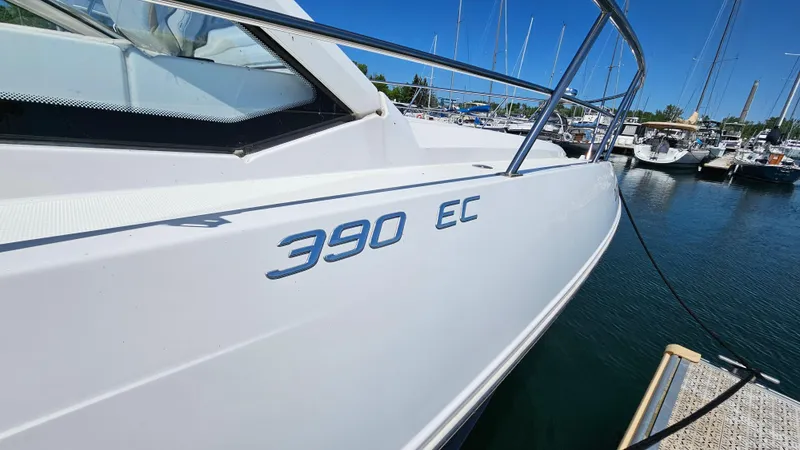  Yacht Photos Pics 2017 Cruisers Yachts 390 Express Coupe docked at marina, side view.