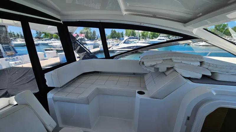  Yacht Photos Pics Interior of 2017 Cruisers Yachts 390 Express Coupe with marina view.