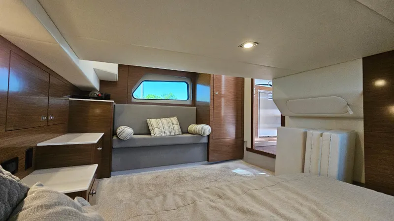  Yacht Photos Pics Luxurious interior of 2017 Cruisers Yachts 390 Express Coupe with modern furnishings.