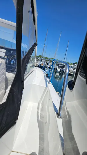  Yacht Photos Pics 2017 Cruisers Yachts 390 Express Coupe docked at marina, clear blue sky.