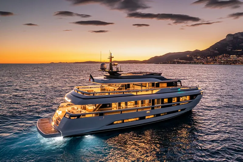 X96 Triplex Yacht Photos Pics Luxury yacht Extra X96 TRIPLEX 2025 at sunset on the ocean.