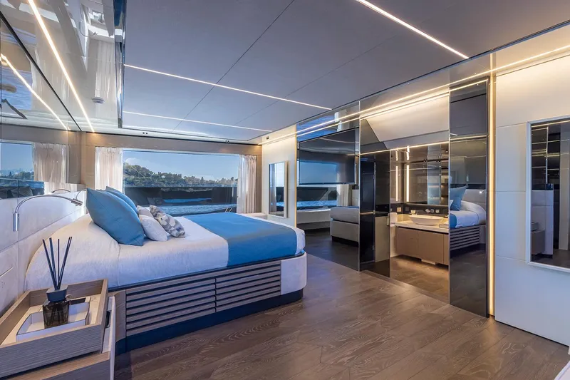 X96 Triplex Yacht Photos Pics Luxurious bedroom interior of the 2025 Extra X96 TRIPLEX yacht with modern design.
