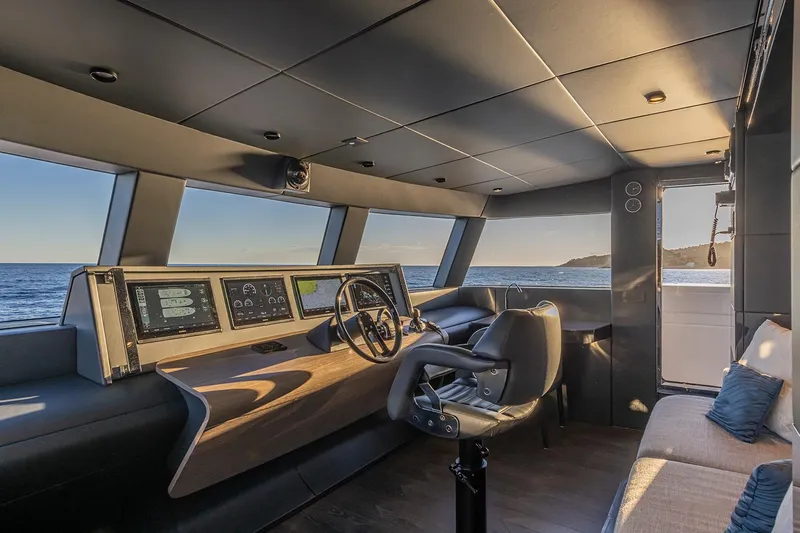 X96 Triplex Yacht Photos Pics Modern helm station of the 2025 Extra X96 TRIPLEX yacht with panoramic sea views.